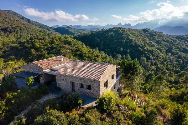 This Corsican Mountain House with a Floating Pool Looks Unreal