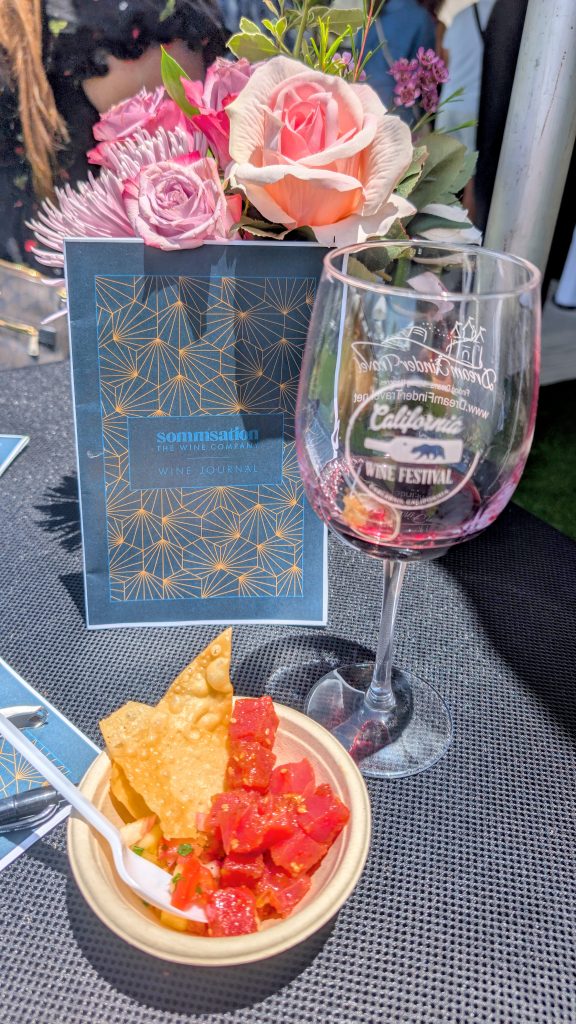 Ceviche and wine on table with roses