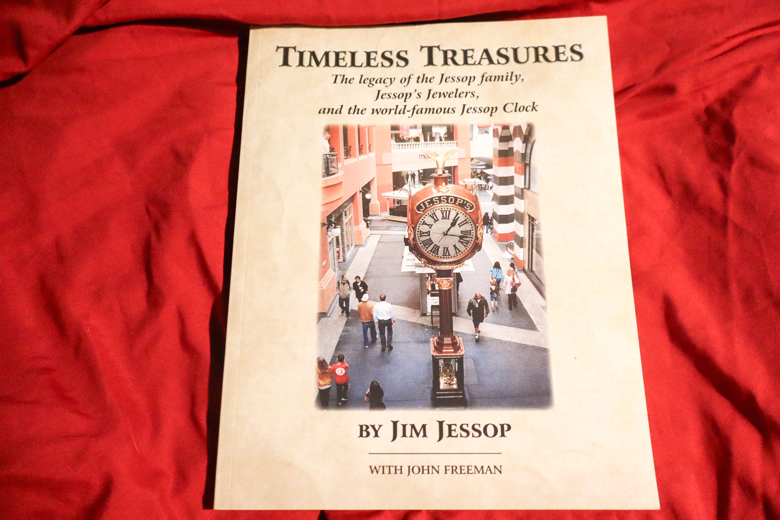 ‘Timeless Treasures: The Legacy of the Jessop family, Jessop’s Jewelers, and the world-famous Jessop Clock,’ is a collaboration between now-retired jeweler Jim Jessop with Point Loma author John Freeman. (Photo by Dave Schwab/Peninsula Beacon)