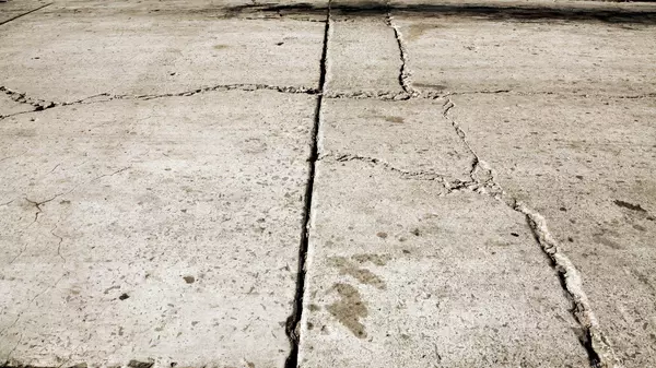 A Tiny Crack in This Homeowner’s Sidewalk Ended Up Costing Her Thousands