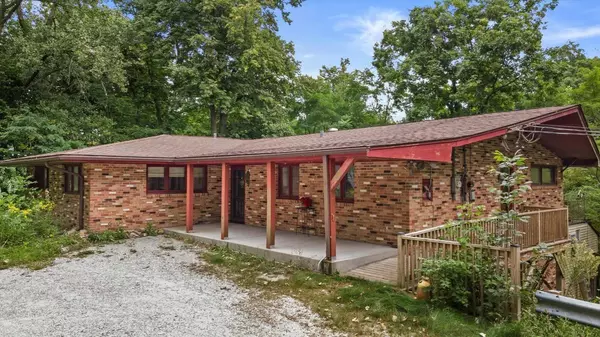 $1 Million Midcentury Modern Ranch House on Lake Michigan Holds a Wild Surprise in the Basement