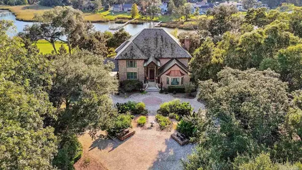 feature image of Opulent European-Inspired Waterfront Estate Once Owned by Famed Attorney Is Listed for $4.15 Million