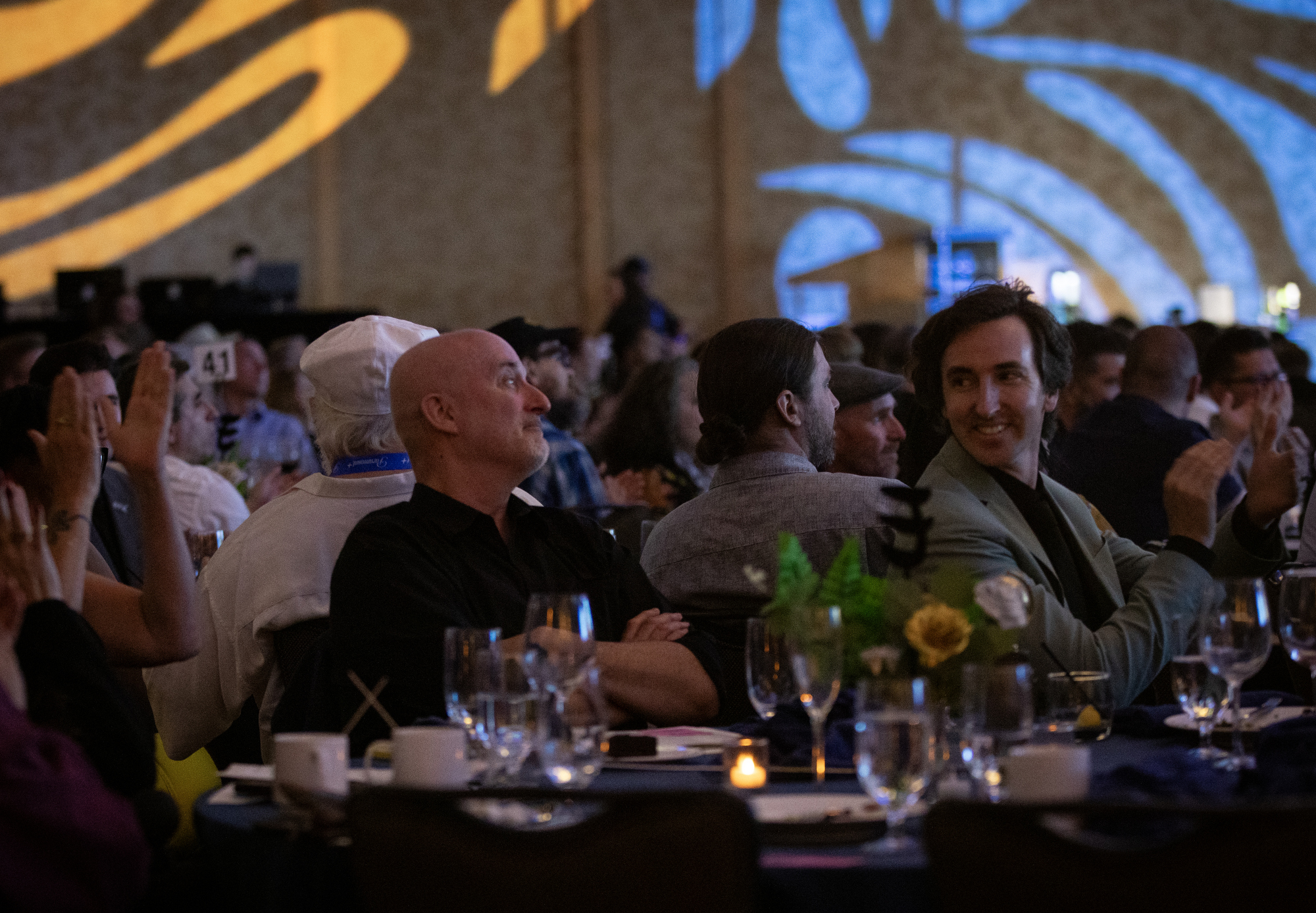 Jon Macy, center, watches as a category where he is nominated is announced during the Eisner Awards ceremony on Friday, July 25, 2025 in San Diego, California. Macy was nominated for two Eisners. (Ana Ramirez / The San Diego Union-Tribune)