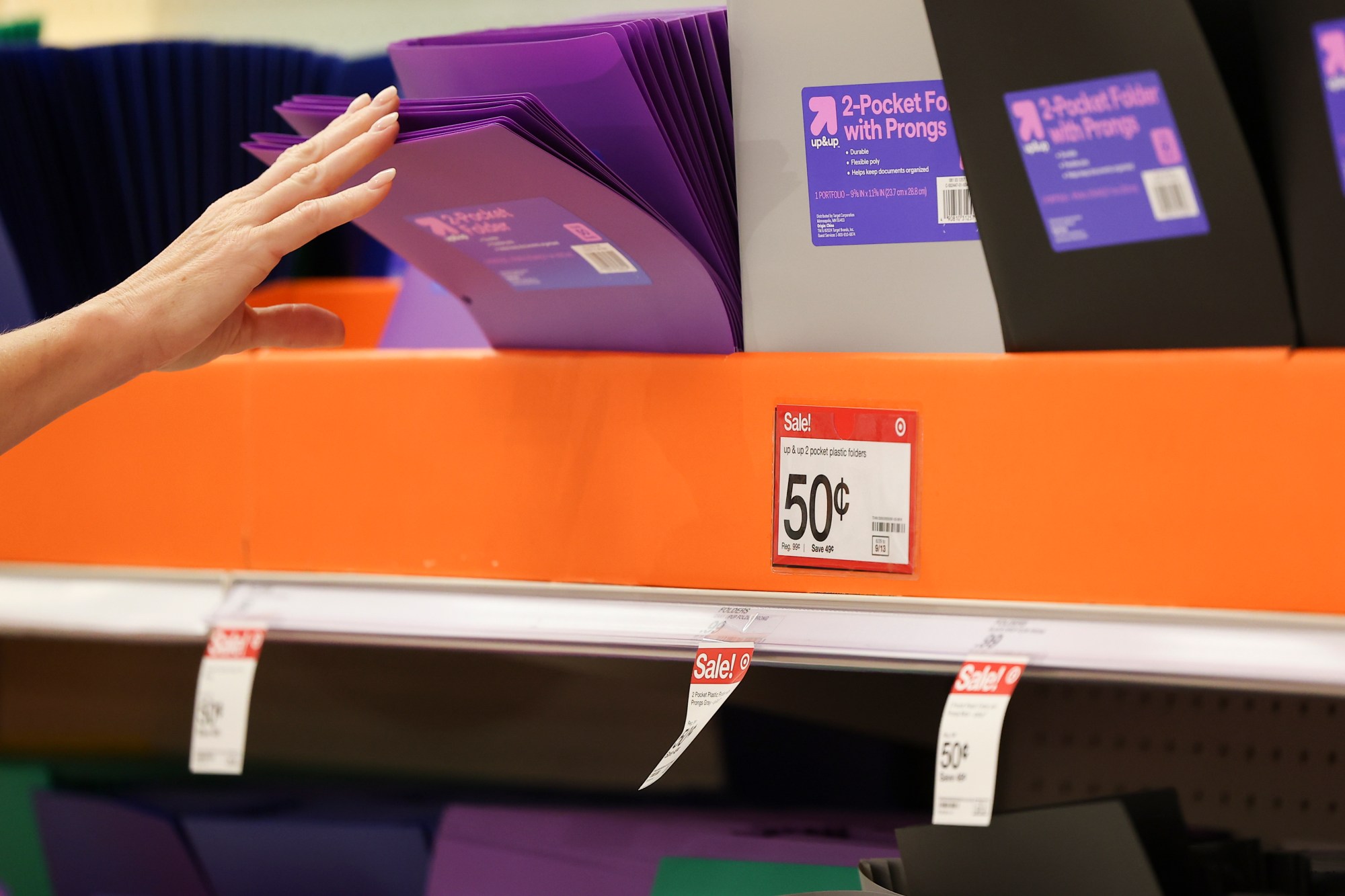 Stacey Gubernator grabs a folder at Target on Tuesday, July 22, 2025 in San Diego, CA. (Meg McLaughlin / The San Diego Union-Tribune)