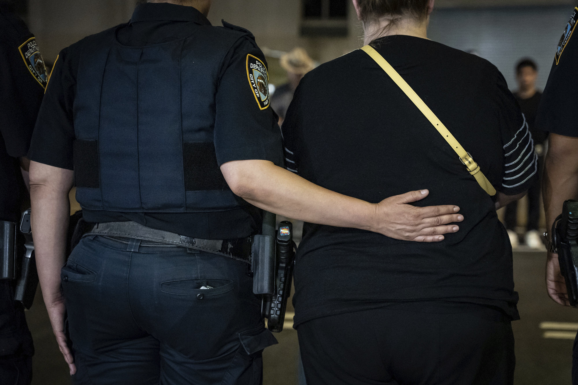NYPD officers stand in line during the dignified transfer of...