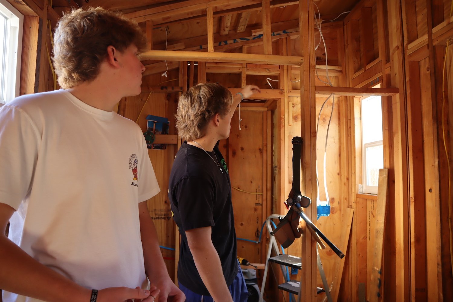 High school students from San Marcos High School working with the Warrior Village Project to build homes for homeless veterans in San Diego