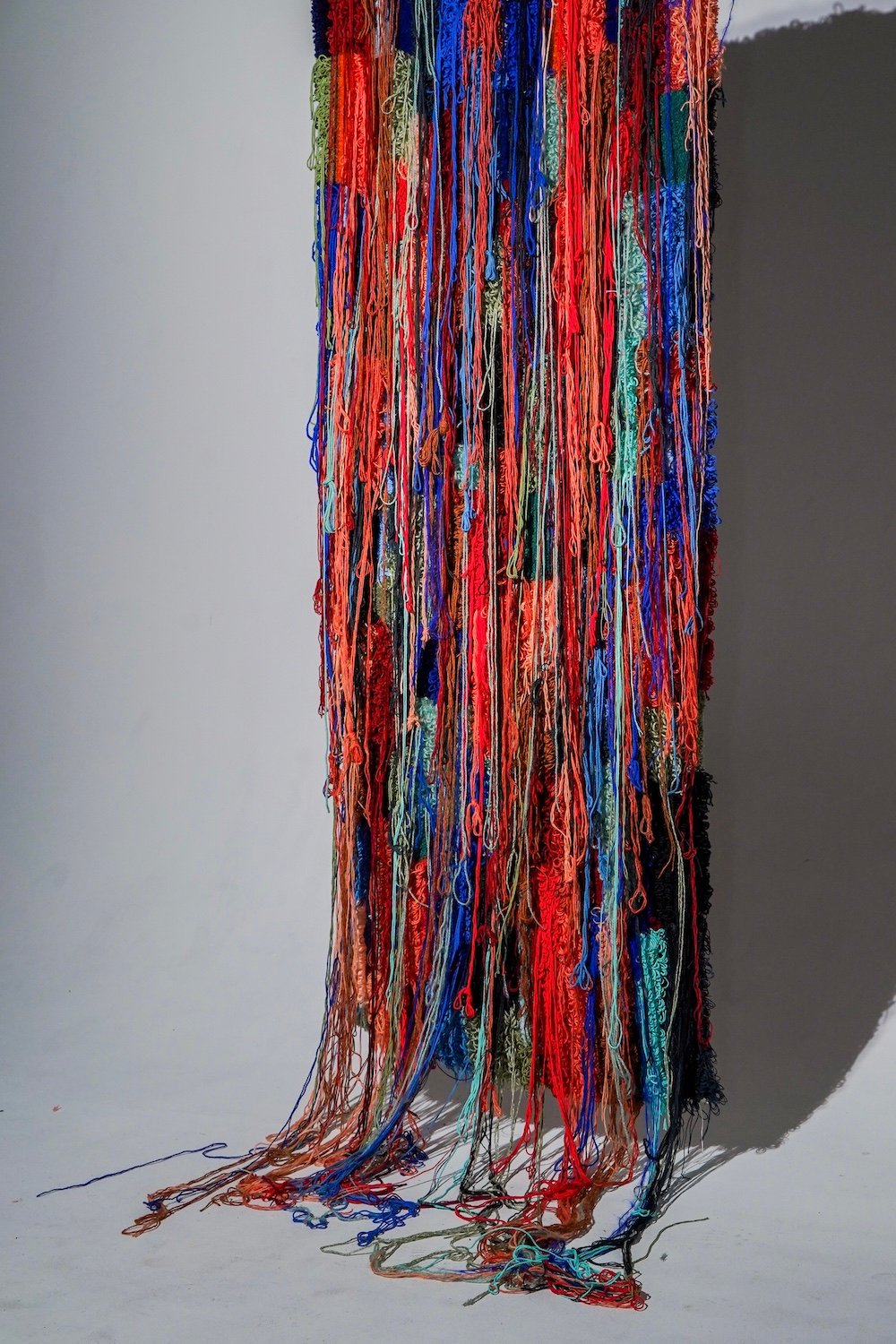 Textile rug art piece from San Diego artist Denja Harris' new art exhibit The Space Between: Texture Studies featured at Oceanside's Museum of Art