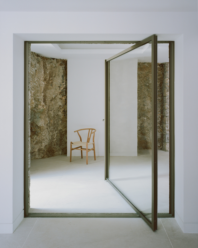 Corfu House Stone pivot door