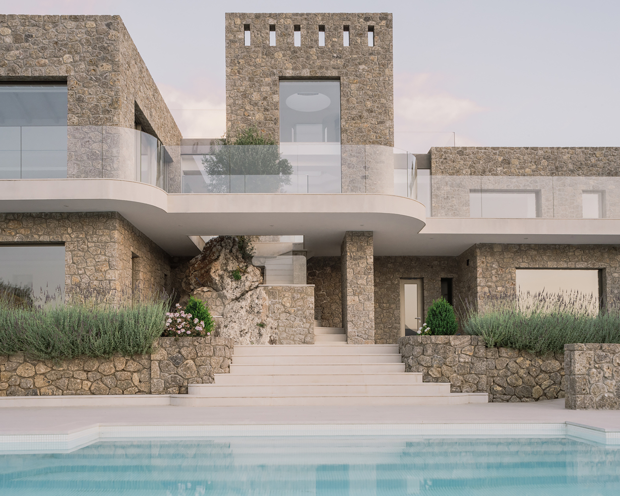 Modern Solidity Meets Transparent Lightness in a Corfu Stone Villa