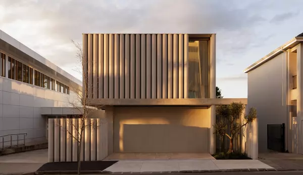 Is This House Wrapped in a Curtain of Concrete?