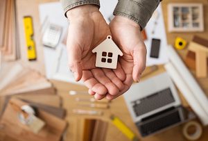 home in the center of the palm of hands