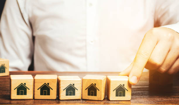 Wooden blocks with house icon impression on each block