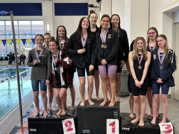 Spring-Ford (center) won the 200 freestyle relay, followed by Pottsgrove (left) and Upper Perkiomen (right).