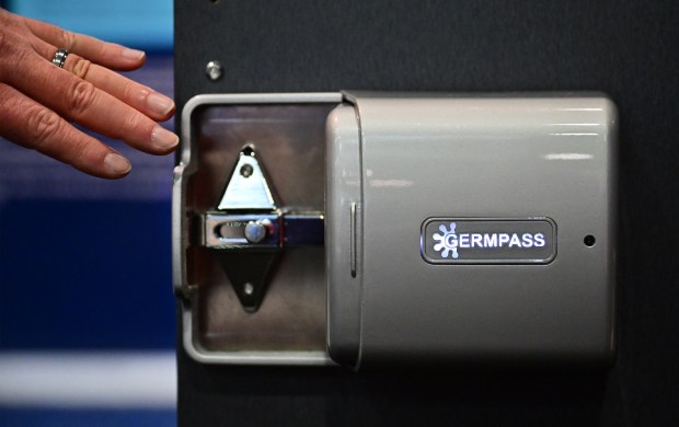 The GermPass bathroom stall door handle from Micro Lumix, which kills germs on touchpoints, is pictured during the Consumer Electronics Show (CES) in Las Vegas, Nevada, on January 11, 2024. (Photo by Frederic J. BROWN / AFP) (Photo by FREDERIC J. BROWN/AFP via Getty Images)