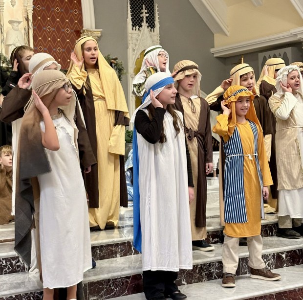 Shepherds sing at the Nativity program at St. Teresa of Calcutta Church. (Submitted Photo)