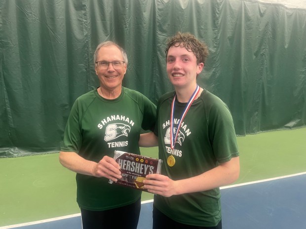 Danny Gallagher with Shanahan head coach Michael Owens following Gallagher's district singles title Friday. Bruce Adams - Daily Local News