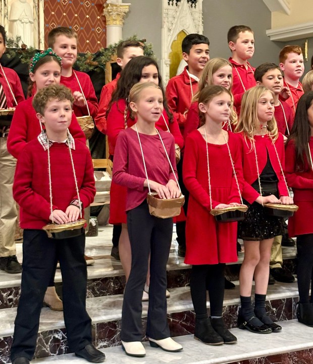 Students perform on drums during the Nativity program at St. Teresa of Calcutta Church. (Submitted Photo)