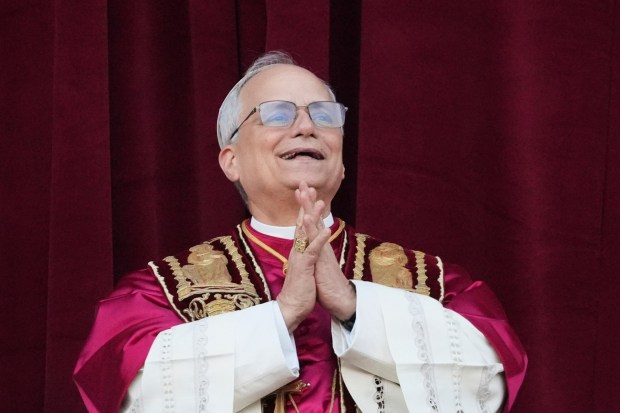 Newly elected Pope Leo XIV appears at the balcony of St. Peter's Basilica at the Vatican, Thursday, May 8, 2025. (Alessandra Tarantino/AP)