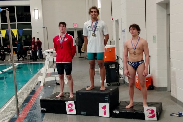 Methacton's Christian Lebold, center, Owen J. Roberts' Ethan Suessmuth, left, and Pope John Paul II's Dominic Testa took the top 3 spots in the 100 breaststroke at the PAC Swimming Championships on Feb. 9 at Upper Merion. (Courtesy Dennis Weller)