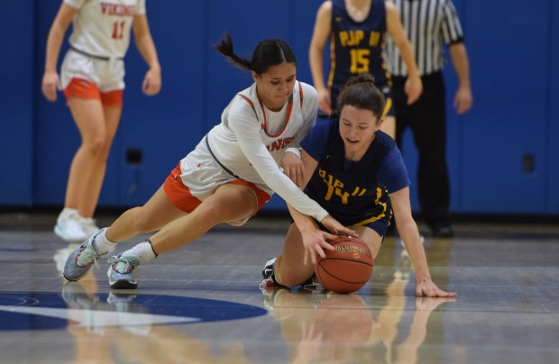 Perkiomen Valley's Bella Bacani (2) and Pope John Paul II's Brooke Albeck dive after a loose ball during a PAC girls' basketball semifinal on Feb. 10 at Spring-Ford. (Austin Hertzog - MediaNews Group)