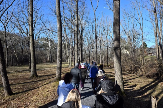 Participants in the Berks County Parks and Recreation Department's Wellness Walk traverse the The Union Canal Towpath on Saturday from the Heritage Center. (BILL UHRICH - READING EAGLE)