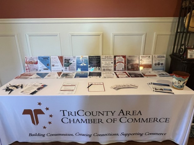 A table holds flyers for upcoming TriCounty Area Chamber of Commerce events, on display at the Sept. 19 membership breakfast at Spring Hollow Golf Club in Spring City. (Photo Courtesy TriCounty Area Chamber of Commerce)