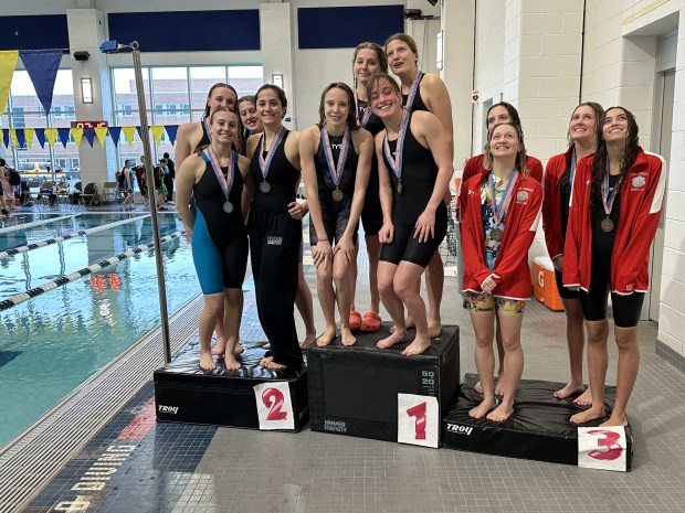 Phoenixville (center) took first place in the 400 freestyle relay, followed by Methacton in second (left) and OJR in third (right).