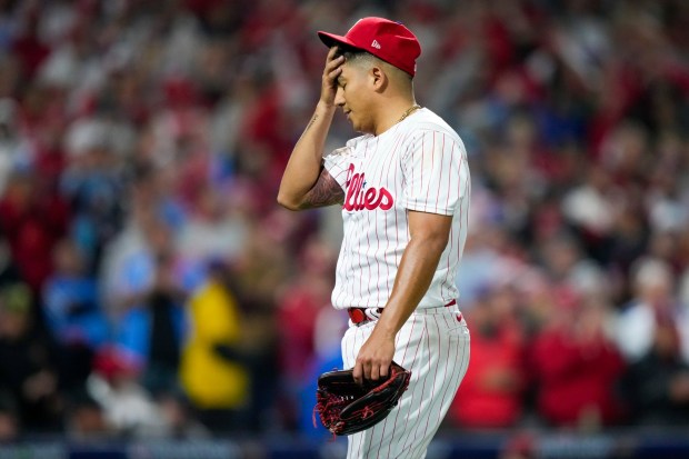 Phillies starting pitcher Ranger Suarez shows how he feels about being lifted after 75 pitches during the fifth inning Tuesday night in Game 7 of the NLCS at Citizens Bank Park. (Matt Slocum - The Associated Press)