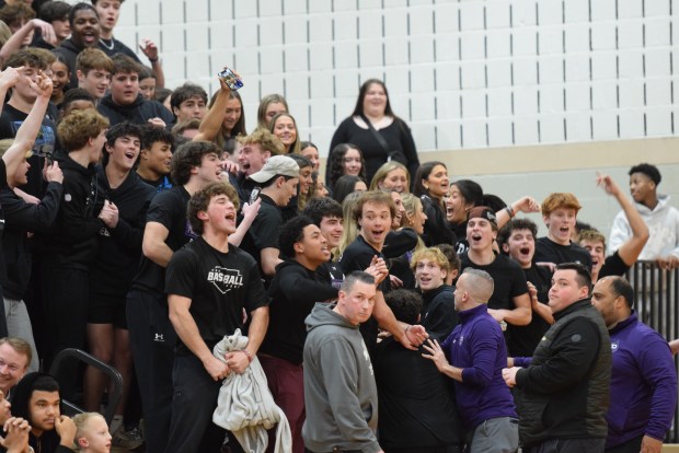 The Phoenixville student section celebrates after Max Lebisky scored the game-winning basket to defeat Spring-Ford in the PAC championship game on Feb. 14 at Perkiomen Valley. (Austin Hertzog - MediaNews Group)