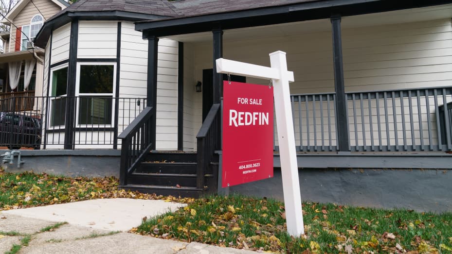 A Redfin sign in front of a home for sale in Atlanta, Georgia, on Thursday, Nov. 10, 2022.