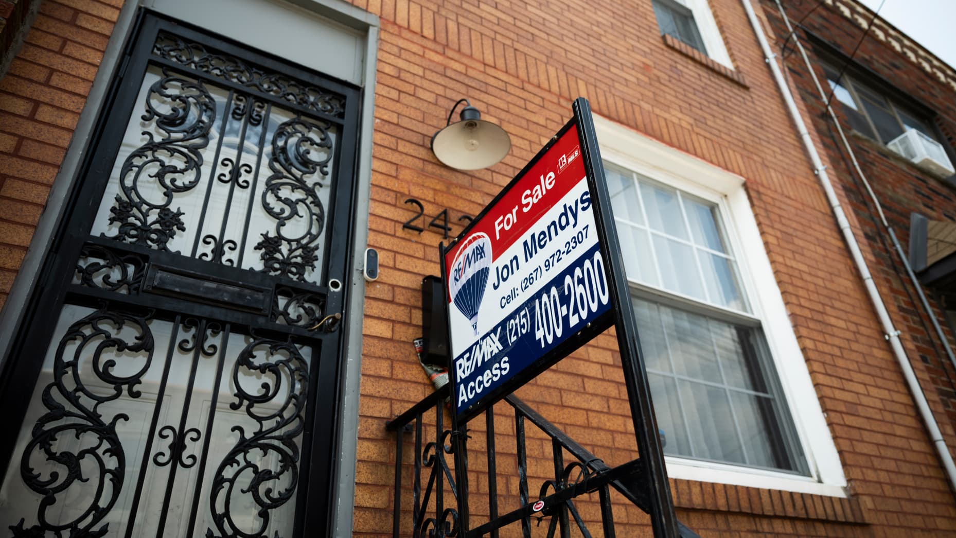 A "For Sale" sign on a house in Philadelphia, Pennsylvania, US, on Friday, Aug. 16, 2024. US Vice President Kamala Harris will propose sweeping new federal subsidies for parents, homebuyers, and Americans with low-incomes alongside new programs to curb increases in rent and grocery prices as she seeks to convince voters that she would act swiftly to address one of their top concerns, rising consumer costs. Photographer: Joe Lamberti/Bloomberg via Getty Images