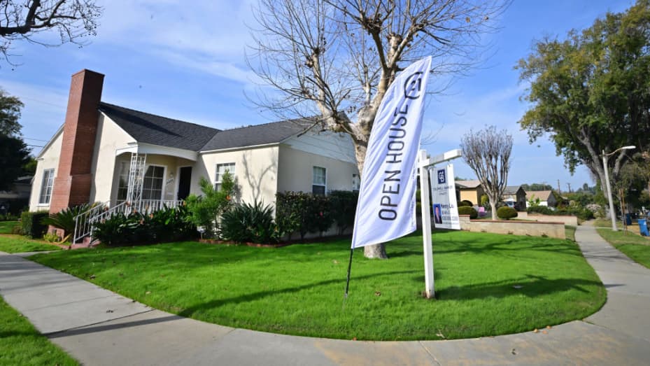 An "Open House" flag is seen in front of a home for sale in Alhambra, California on January 18, 2024. Mortgage rates this week have dropped to its lowest level in eight months for potential US homebuyers but affordability remains a challenge. (Photo by Frederic J. BROWN / AFP) (Photo by FREDERIC J. BROWN/AFP via Getty Images)