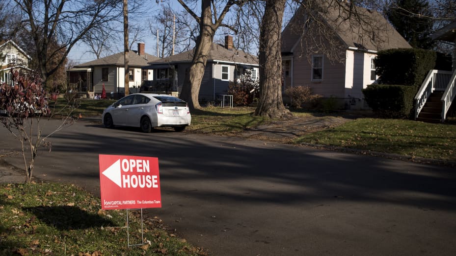 An "Open House" sign is displayed in the front yard of a home for sale in Columbus, Ohio, U.S.