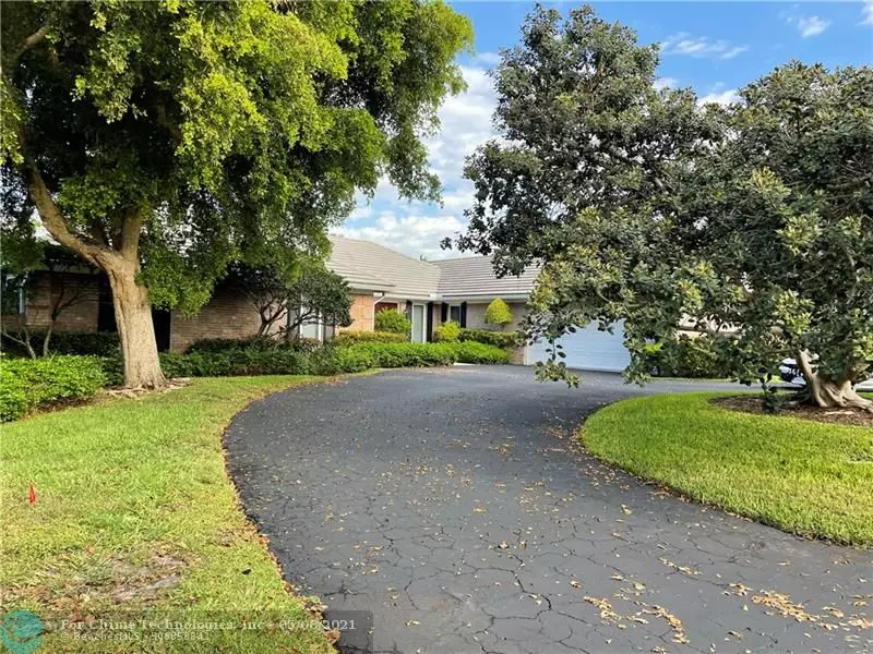 44 Cayuga Rd, Sea Ranch Lakes, FL 33308