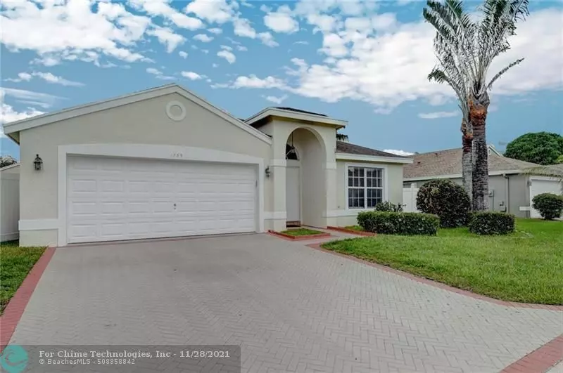 1739 Sawgrass Circle, Green Acres, FL 33413