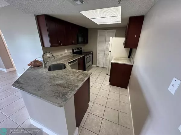 Coconut Creek, FL 33073,5005 Wiles Rd  #104