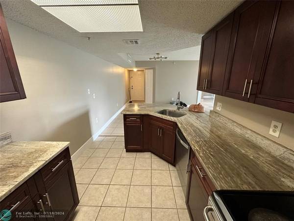 Coconut Creek, FL 33073,5005 Wiles Rd  #104