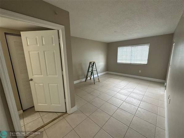 Coconut Creek, FL 33073,5005 Wiles Rd  #104