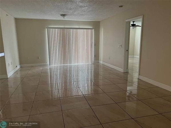 Coconut Creek, FL 33073,5065 Wiles Rd  #103