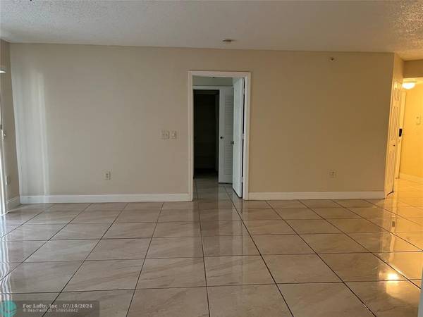 Coconut Creek, FL 33073,5065 Wiles Rd  #103