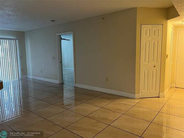 Coconut Creek, FL 33073,5065 Wiles Rd  #103