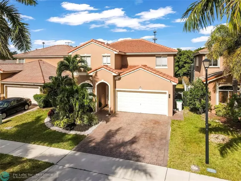 5143 Woodfield Way, Coconut Creek, FL 33073