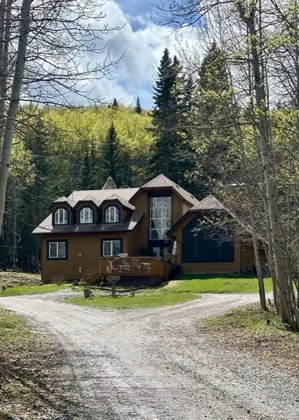 135 Wild Rose Close, Bragg Creek, AB T0L 0K0