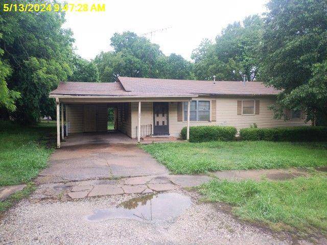 Wolfe City, TX 75496,105 W Dallas Street