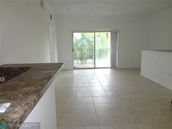 5860 W Sample Rd  #307, Coral Springs, FL 33067