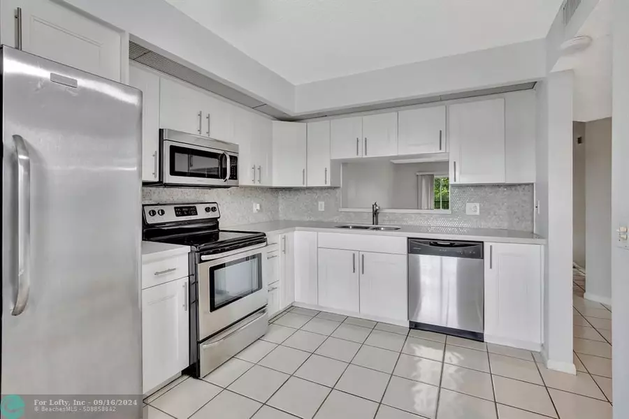 900 SW 142nd Ave  #408 L, Pembroke Pines, FL 33027