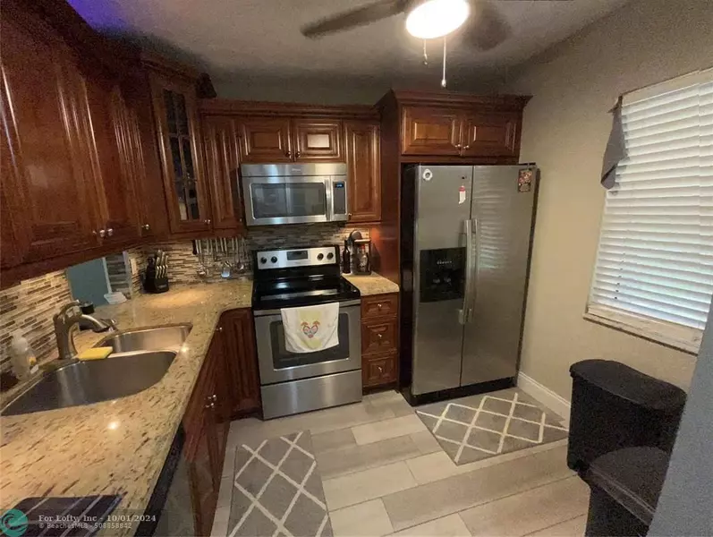 2851 Somerset  #100 BldgE, Oakland Park, FL 33311