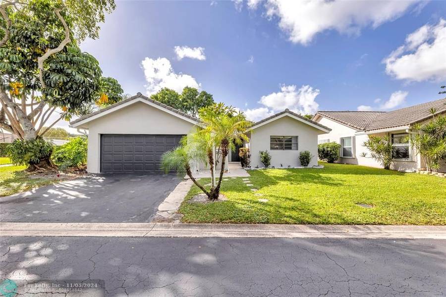 1296 Spring Circle Dr, Coral Springs, FL 33071