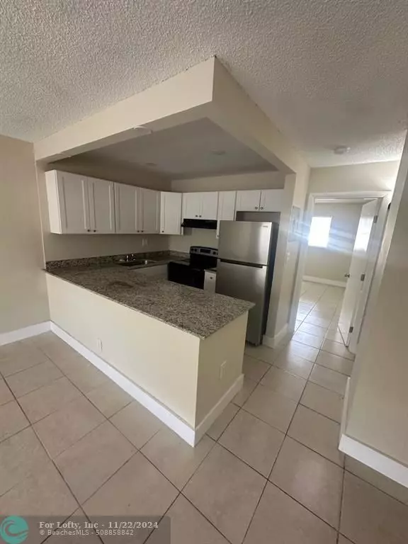 Pompano Beach, FL 33064,201 NW 32nd Ct  #203