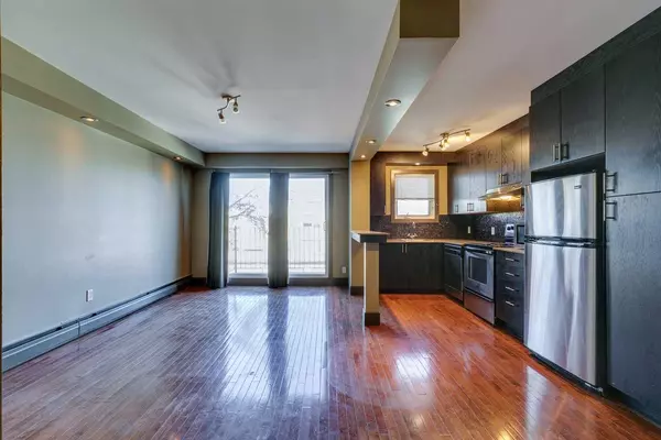 Calgary, AB T3C 0T9,1736 13 AVE SW #303